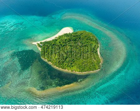 Aerial Drone Of Island In The Blue Sea With Atoll And The Beach. Agutaya Island, Philippines.