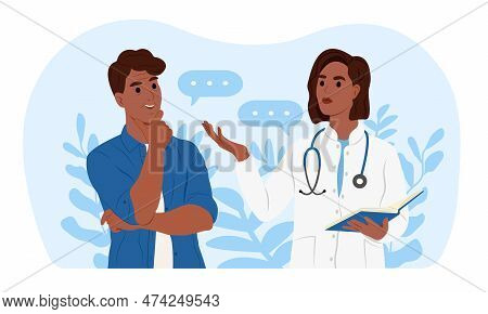 An African-american Female Family Doctor Is Talking To An Elderly African-american Male Patient