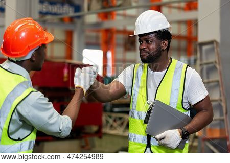 Male Worker African American Teamwork Engineer Successful Handshake At Industrial. Contract Conectio