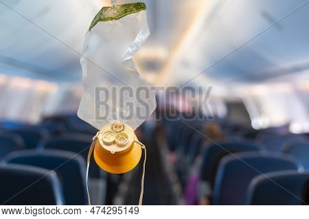 Oxygen Mask Drop From The Ceiling Compartment On Airplane..