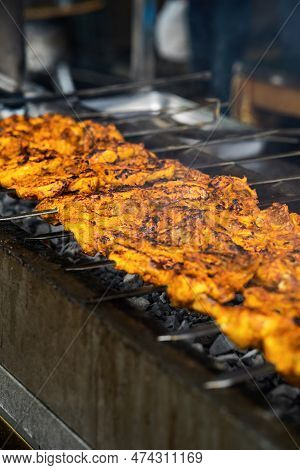 Cooking Chicken Skew Kebab Barbeque. Traditional Indian And Paksitan Dish Cooked On Charcoal And Fla