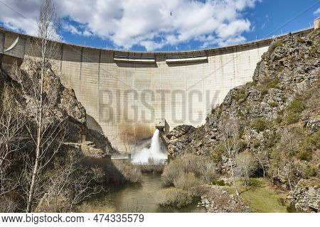 Dam Draining Water In Riano. Hydraulic Power. Castilla Leon. Spain