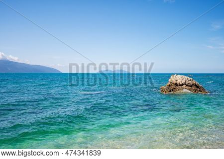 City Beach Of Vlora Resort Town, Albania. Summer Sunny Day. View Of The City And The Adriatic Sea