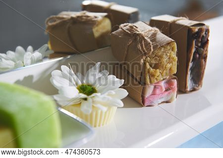 Still Life With Handmade Organic Soap Bars, Dry Solid Shampoo And Hair Conditioner With Natural Ingr