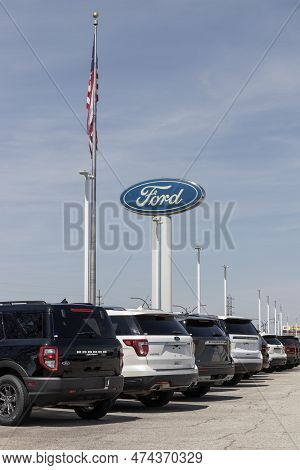 Lafayette - Circa April 2023: Ford Car, Suv And Pickup Truck Dealership. Ford Manufactures The F-150