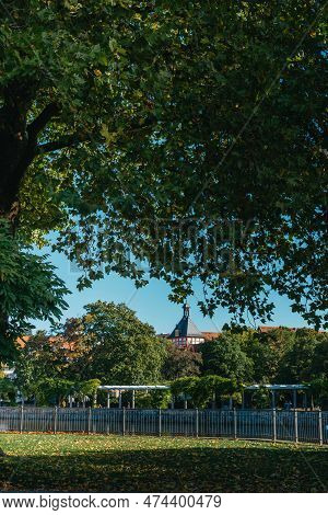 View Through The Trees On An Old European City Bietigheim-bissingen In Germany. Trees In The City Pa