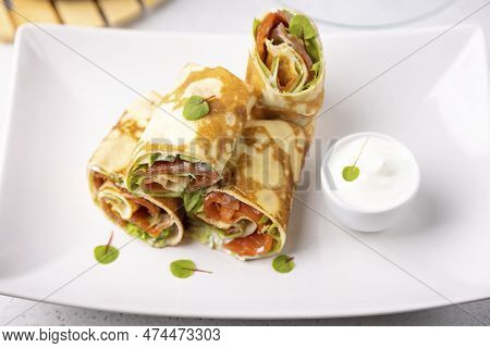 Pancakes With Salmon (trout), Sour Cream And Greenstuff. Thin, Not Sweet Blinchiki Stuffed With Red 