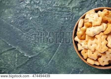 Top View Little Salted Crackers Inside Plate On Dark Background Crisp Pepper Color Snack Cips Salt B