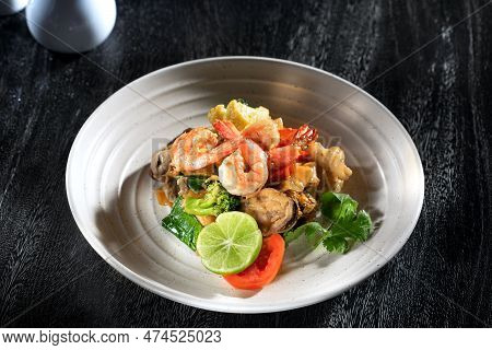 Close Up View Of Nice Yummy Tempura Shrimps On Dark Grey Back