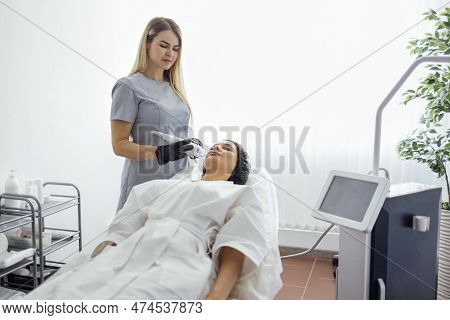 Microneedle Rf Lifting Procedure. Hardware Cosmetology. Beautician Conducts A Facial Rejuvenation Pr