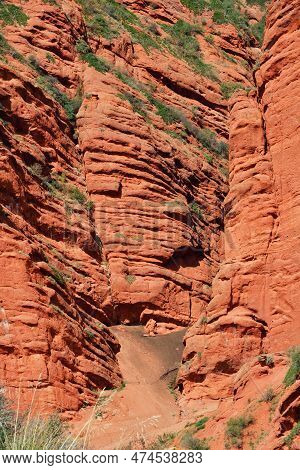 Unusual Rock Formations From Red Sandstone In Canyon Seven Bulls In Jeti-oguz, Kyrgyzstan