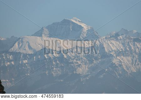 Thun, Switzerland, February 12, 2023 Fantastic View Over The Snow Covered Alps From The Schadau Park