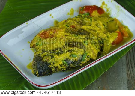 Pesmol Ikan Is A Fish Dish Of Gourami, Mackerel, Tilapia Or Else Cooked In Turmeric Sauce With .