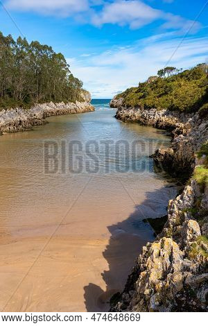Inland Beach Of Sea Water That Goes Into The Forest Forming A Haven Of Calm Water, Asturias, Spain.