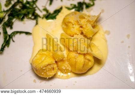 Italian Food, Fresh Home Made Pumpkin Stuffed Pasta Tortellini Or Ravioli Dumplings With Parmesan Pa