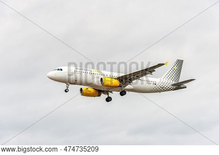London, England - August 22, 2016: Ec-lun Vueling Airlines Airbus A320 Landing In London Heathrow In