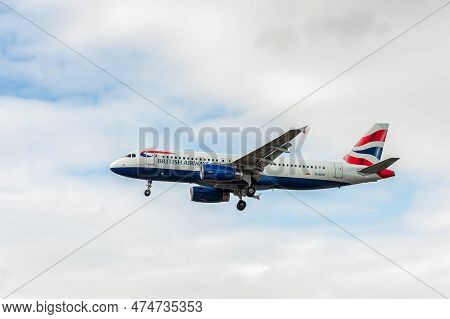 London, England - August 22, 2016: G-euui British Airways Airbus A320 Landing In London Heathrow Int