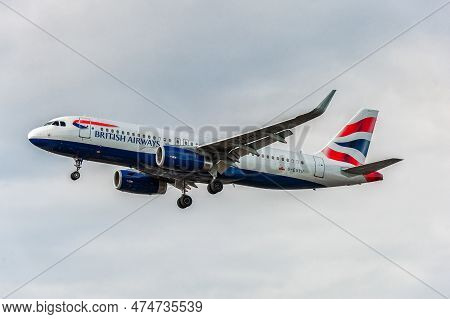 London, England - August 22, 2016: G-euyy British Airways Airbus A320 Landing In London Heathrow Int
