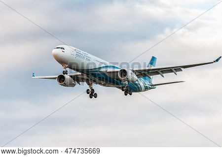 London, England - August 22, 2016: A4o-dd Oman Air Airlines Airbus A330 Landing In London Heathrow I