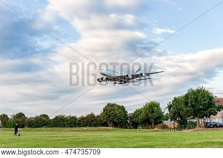 London, England - August 22, 2016: A6-een Emirates Airlines Airbus A380 Landing In London Heathrow I