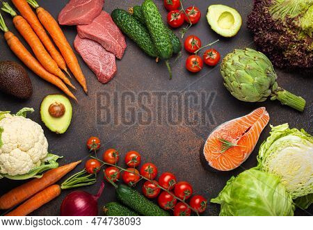 Assorted Food Raw Products: Vegetables, Beef Meat Steak, Fish Salmon Fillet On Dark Rustic Brown Sto