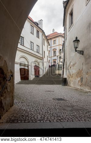 Prague, Czechia - 03.24.2023: People Walking In Romantic Old Narrow Isles Of Old City Of Prague.