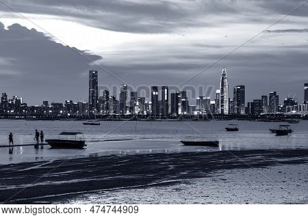 Skyline Of Shenzhen City, China At Dusk. Viewed From Hong Kong Border Lau Fau Shan