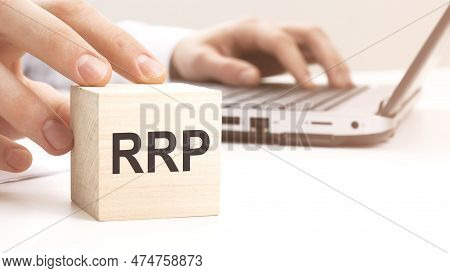 Rrp Text Wooden Block On White Table Background. Idea, Strategy, Advertising, Marketing, Keyword And