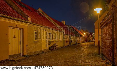 The Illuminated Cobblestone Street Strandstræde During The Twilight Hour, Kaulundborg, Denmark, Apri