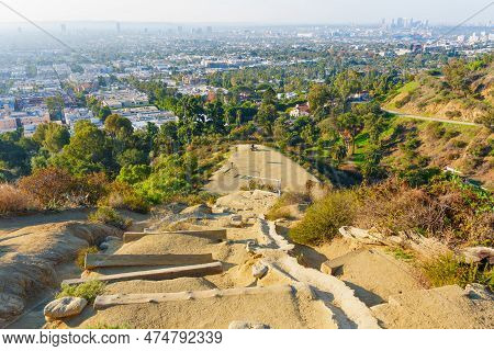 Hiking Trail In Runyon Canyon Park Leading To A Scenic Vista Point With The View Of Los Angeles Skyl