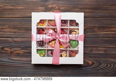 Box With Sweet Chocolate Candies On Color Background, Various Candy Sweets. Valentines Day Gift Box.
