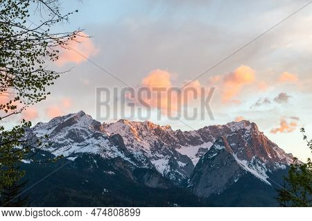 Orange Clouds Over Mountain Range Waxenstein In Alps Of Bavaria