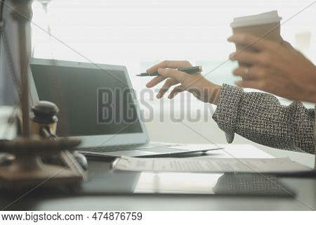 Justice And Law Concept. Legal Counsel Presents To The Client A Signed Contract With Gavel And Legal