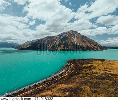Lake Pukaki And Lake Ben Ohau View From Glentanner Park Centre Near Mount Cook On A Background Of Bl