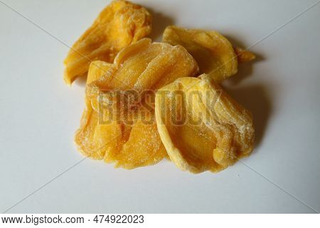 Handful Of Fleshy Yellow Dried Jack Fruit Chips