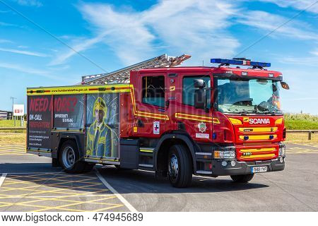 Flamborough, Uk - June 12, 2022: Modern Fire Engine Truck In Flamborough In A Summer Day, Yorkshire,