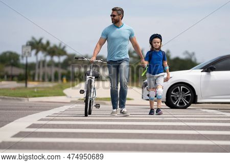 Safety On Road. Pedestrian Crossing For Cyclists. Father And Son Ride A Bicycle. Father Support And 