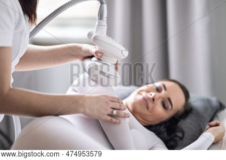 Arm Skincare And Beautification Treatment Of A Woman In Cosmetics Studio By An Lpg Endermology.