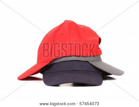 Stack of working peaked cap.