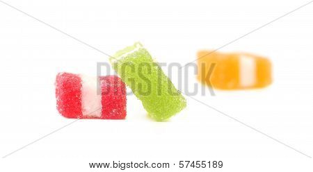 Three different fruit-paste candies.