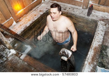 The Man Bathes In An Ice-hole