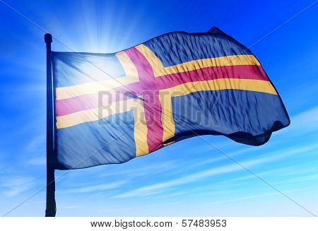 Aland Islands flag waving on the wind