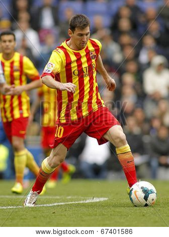 BARCELONA - MARCH, 29: Leo Messi of FC Barcelona in action during a Spanish League match against RCD Espanyol at the Estadi Cornella on March 29, 2014 in Barcelona, Spain