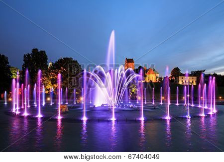 The illuminated fountain at night