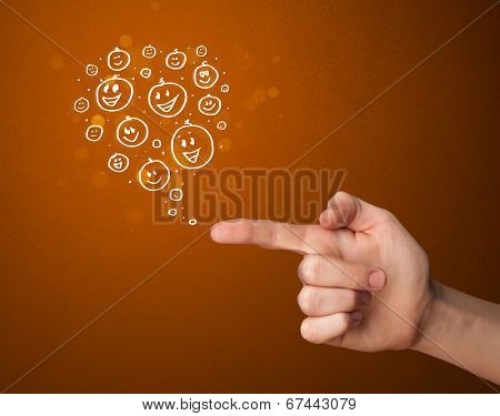 Group of happy hand drawed smiley faces coming out of gun shaped hands