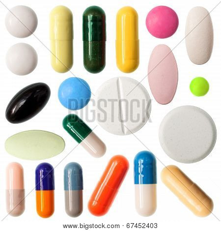Pills And Capsules On White Background