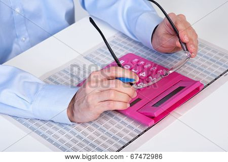 The Business man And Calculator