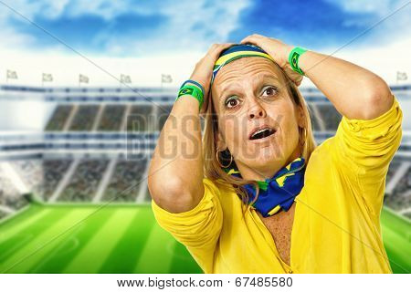 Brazilian fan desperate in a statium background