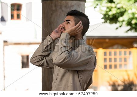 Young Muslim Guy Praying