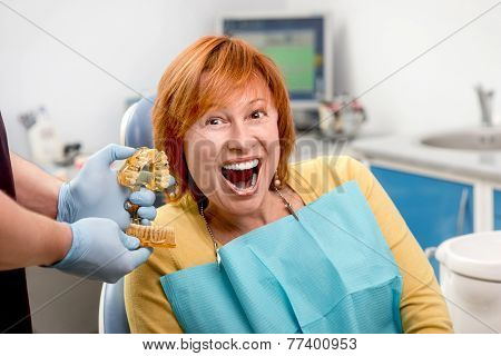Senior woman in the dental office.